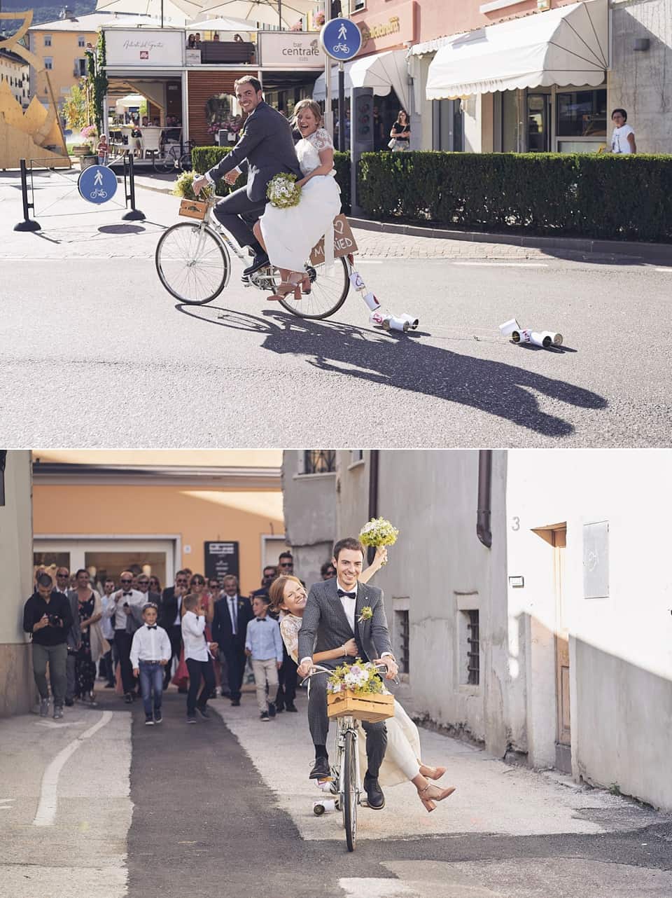 gli sposi raggiungono il ricevimento in bicicletta fotografo per matrimoni Brescia
